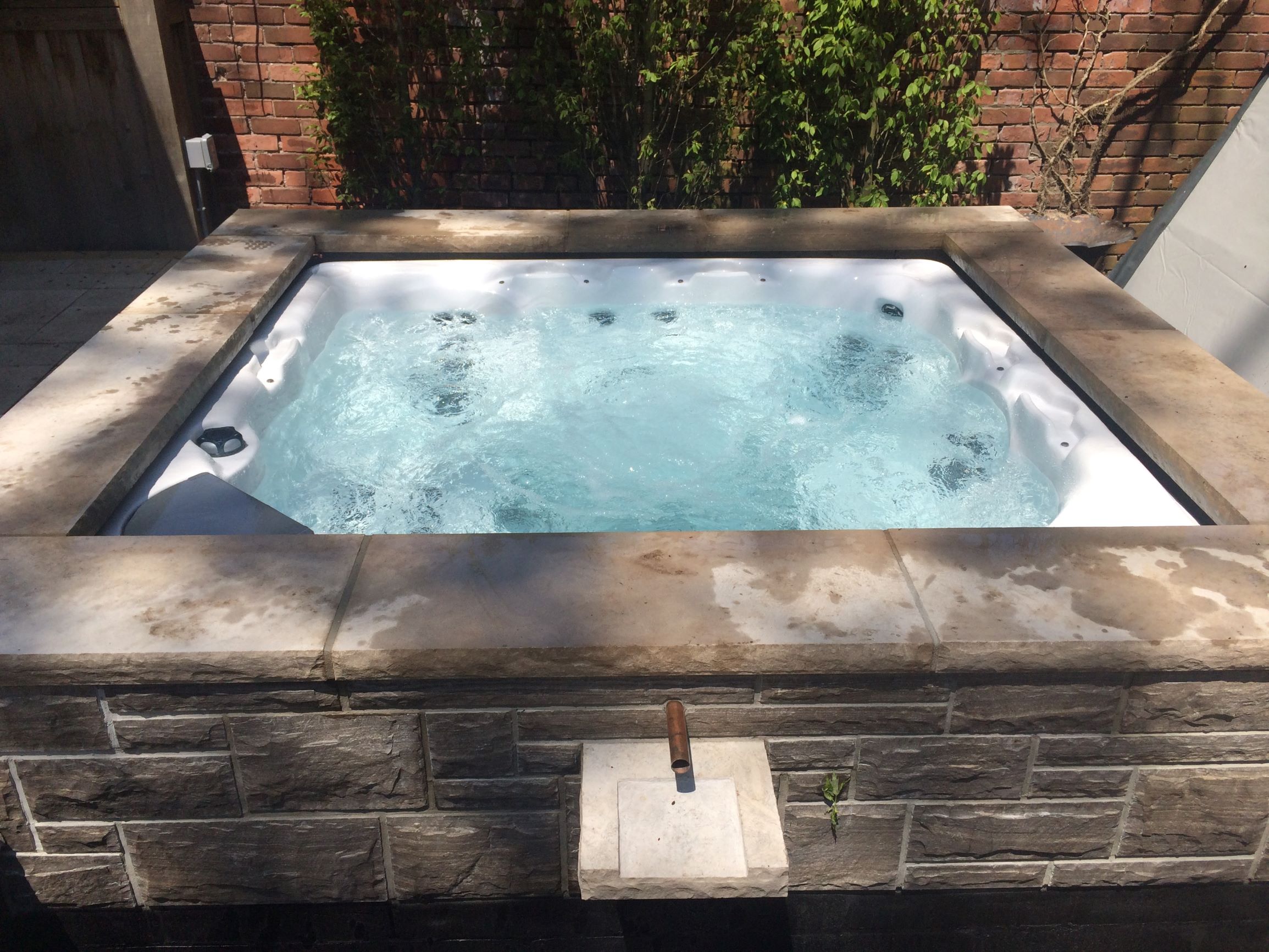 Oily Film in Hot Tub? Causes and Treatments