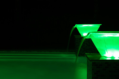 Green light-up water bowl landscape design by Seaway Pools