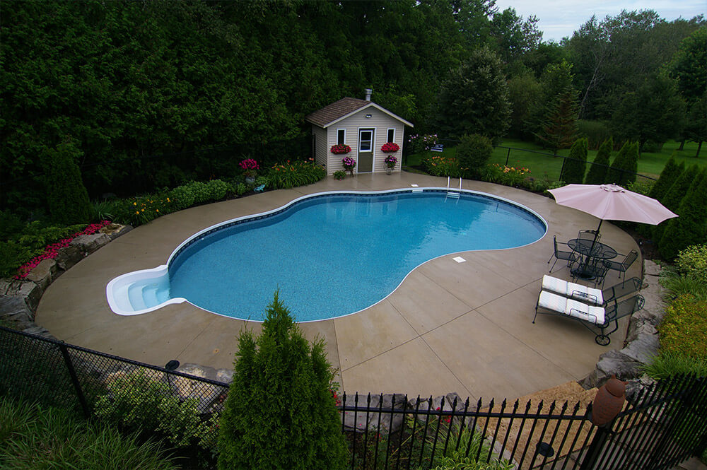 Swimming pool and patio stone installation by Seaway Pools & Hot Tubs
